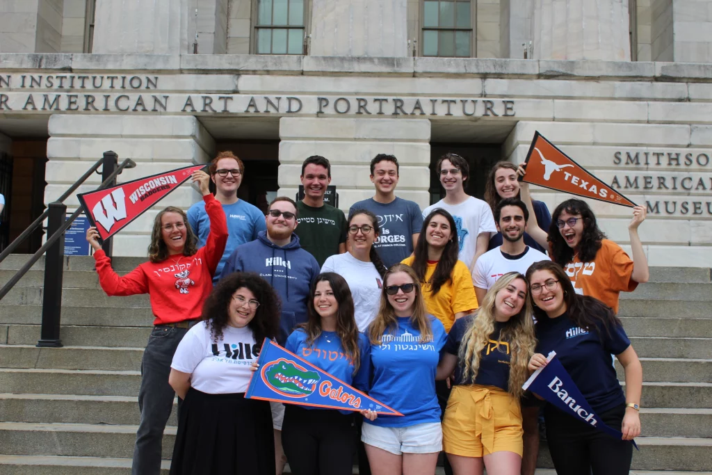 A group of students in college attire.