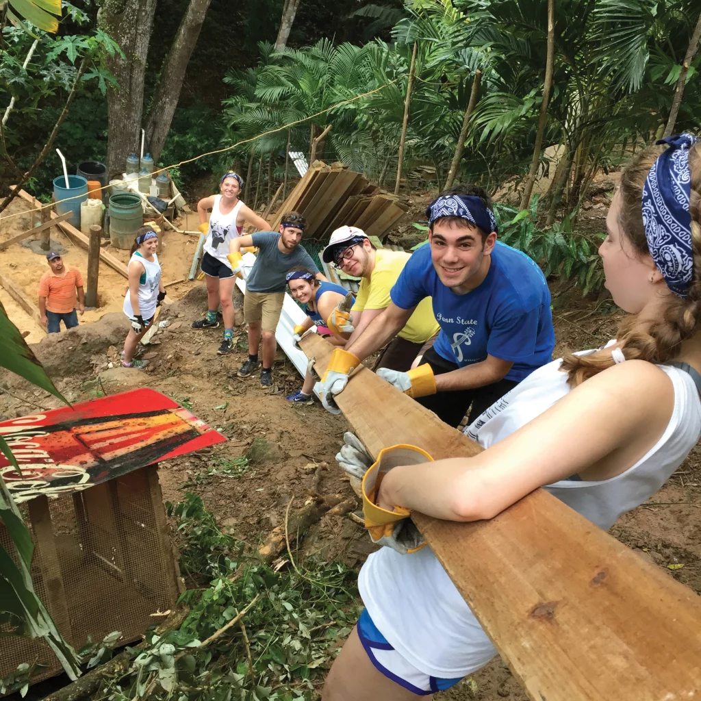 Penn State students building a structure on an alternative spring break